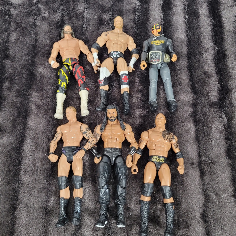 WWE Action Figure Lot of 6 The Rock Roman Reigns Triple H Rey Mysterio Wrestling